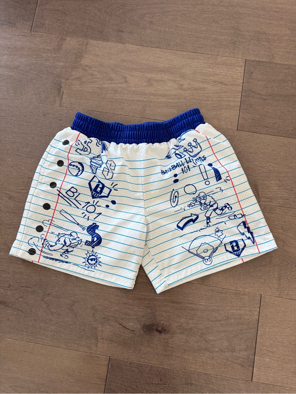 Notebook-Print Kids Shorts with Blue Elastic Waist